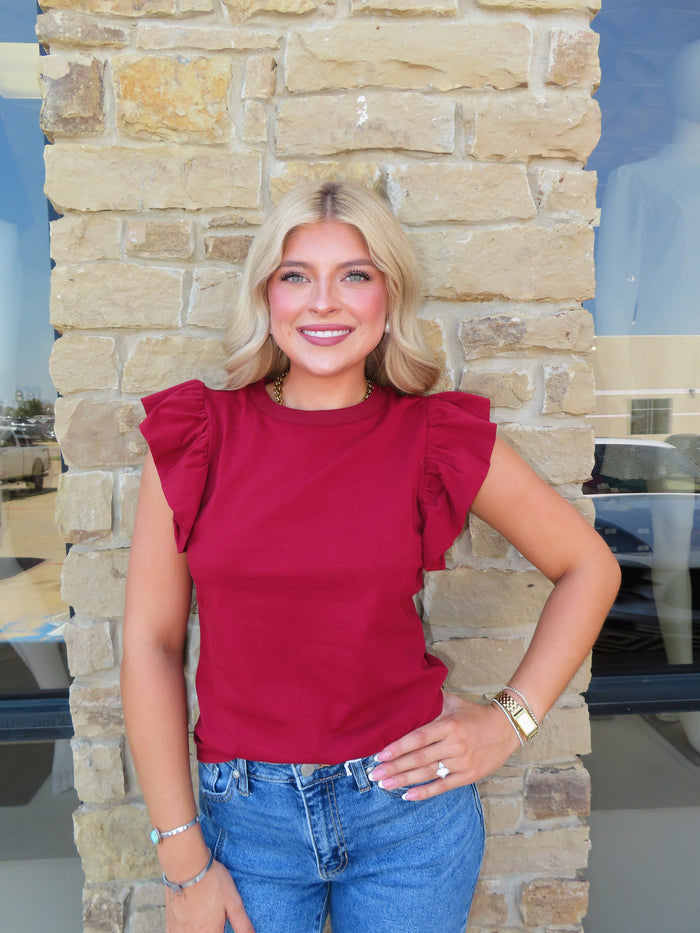 CRIMSON RUFFLE SLEEEVLESS TOP