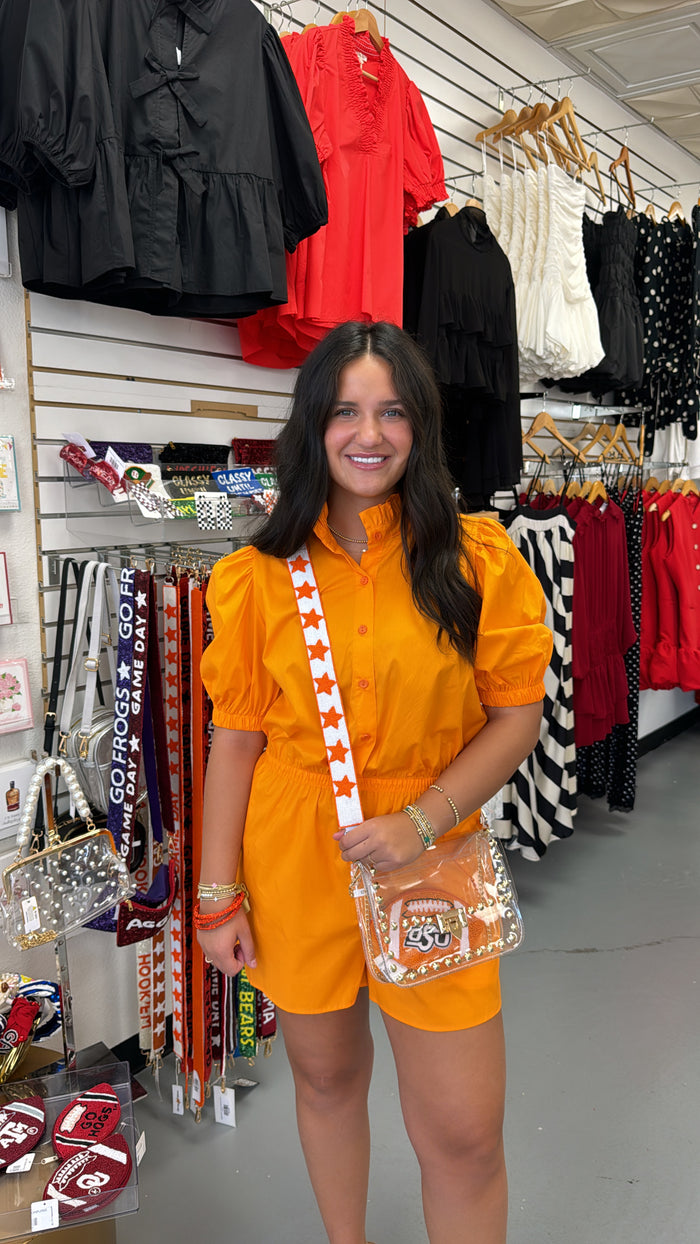ORANGE RUFFLE BUTTON DOWN ROMPER